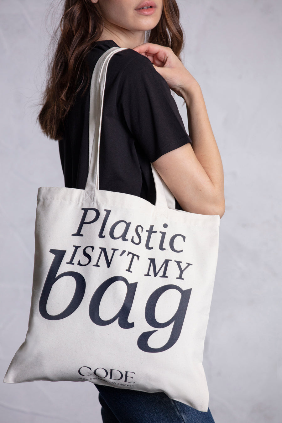 Tote bag alusiva ao mês da sustentabilidade com alças de ombro.